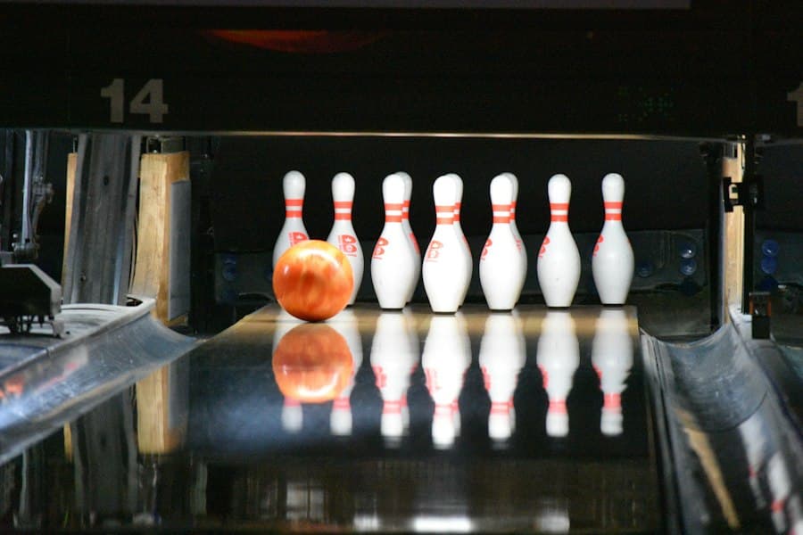 Bowling ball and pins on a lane
